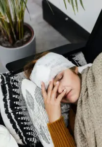 A woman with a head injury laying down. 